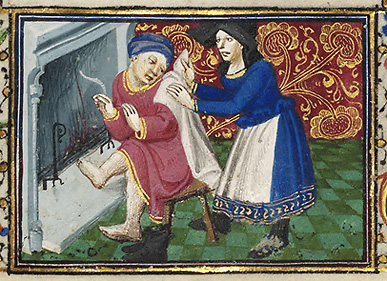 A Peasant Warming by the Fire, "Manuscript, Book of Hours" (the 'Margaret de Foix Hours'),  France (Rennes?), ca. 1471-1476; France; ©Victoria and Albert Museum